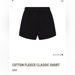 skims cotton fleece classic shorts in the color onyx